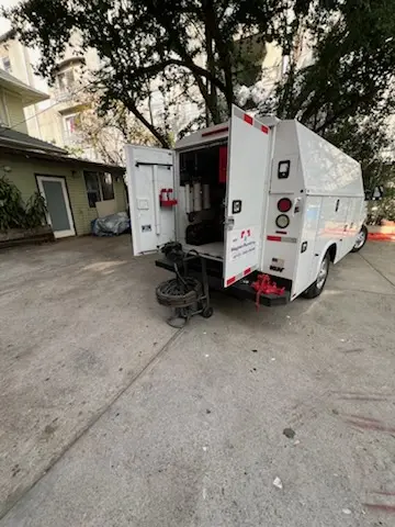 Magnet Plumbing service vehicle on-site for Water Heater Repair in Honeygo